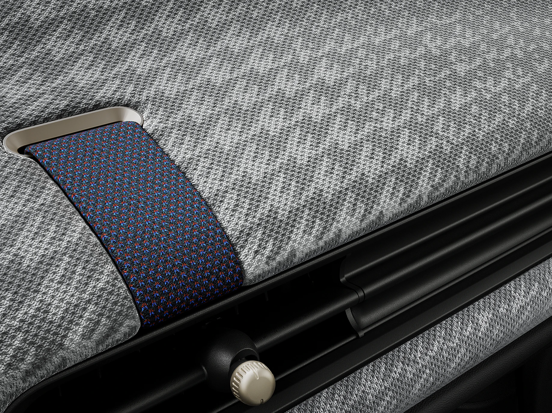 Közeli felvétel a MINI Cooper utasteréről, a 2D kötött műszerfalról.