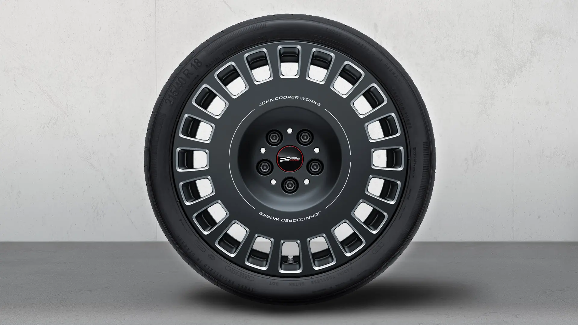 18" JCW könnyűfém keréktárcsa, Rallye Spoke 964, kétszínű (Frozen Midnight Grey, polírozott), komplett nyári kerékkészlet részeként.