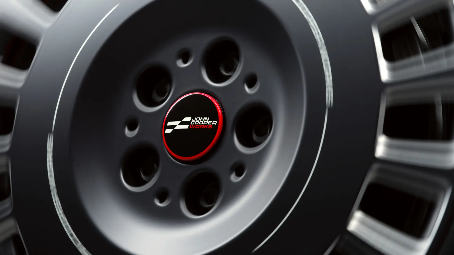 A John Cooper Works lebegő kerékagyvédő nem fordul a kerékkel, hanem vezetés közben is vízszintes marad. 